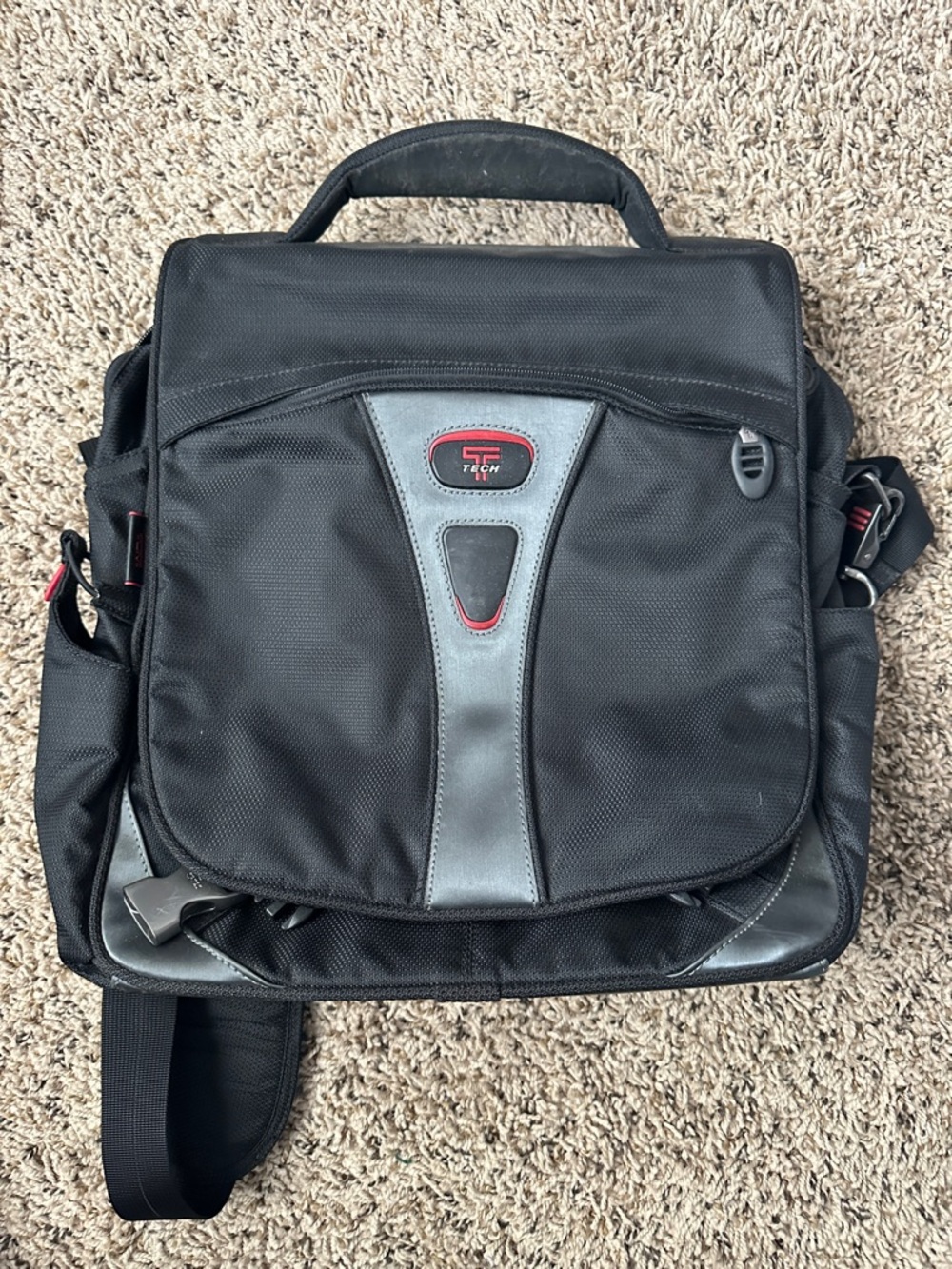 Tumi Black Laptop Messenger Bag with Gray Panels and Red Trim